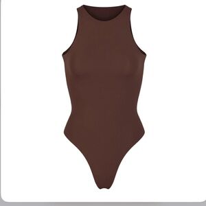 Skims high neck bodysuit in the color COCOA. Size L. Only worn a couple times!